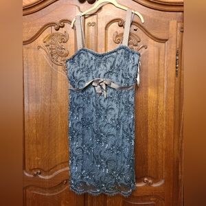 One owner, never worn. Selling because I need the money to move.